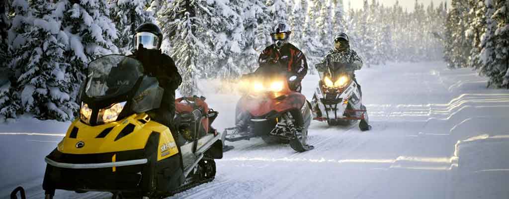 Snowmobiling on a groomed trail in Brant County